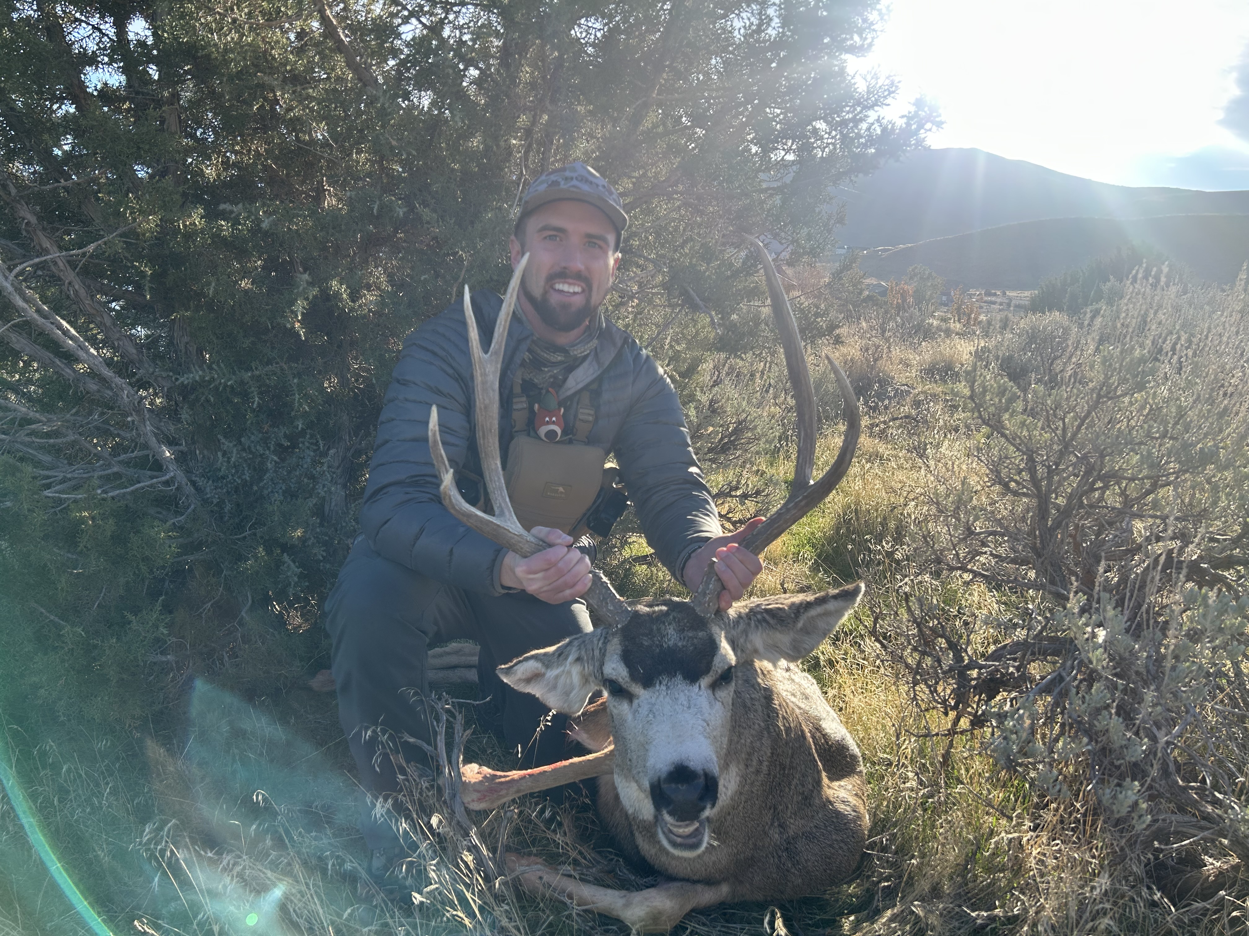 Hunter with harvested elk at the trailhead